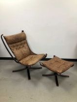 An unmarked bentwood and leather Falcon chair and footstool,
