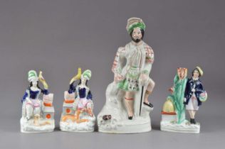 A collection of 19th century Staffordshire figures and one spill vase,
