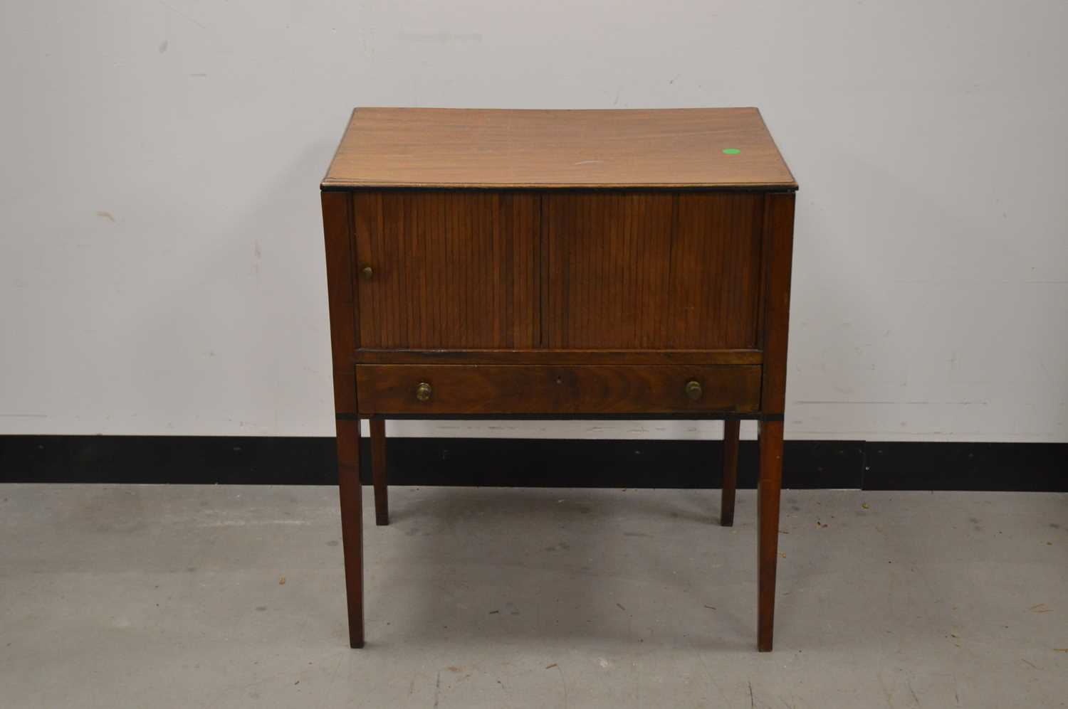 An early 20th century mahogany tambour fronted side cabinet,