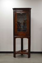 A 19th century and later mahogany corner cabinet and stand,