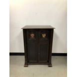 A 19th century and later converted oak cupboard,