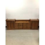An Edwardian ecclesiastical pitch pine cabinet,