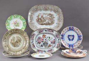 An assorted collection of 19th century and later plates and platters,