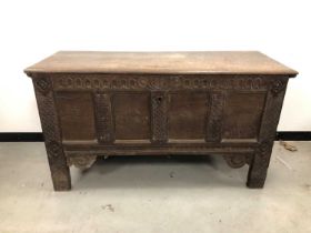 A 18th century and later oak coffer,