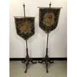 A pair of Victorian pole screens,
