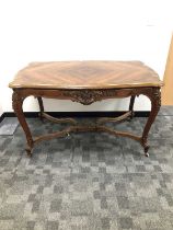 A 19th century Continental crossbanded mahogany table,