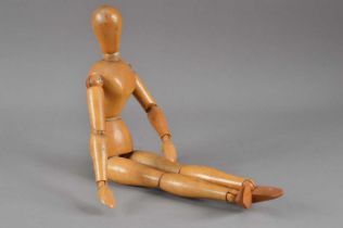 A 20th century wooden articulated figure,