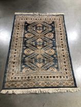 A woollen Persian rug,