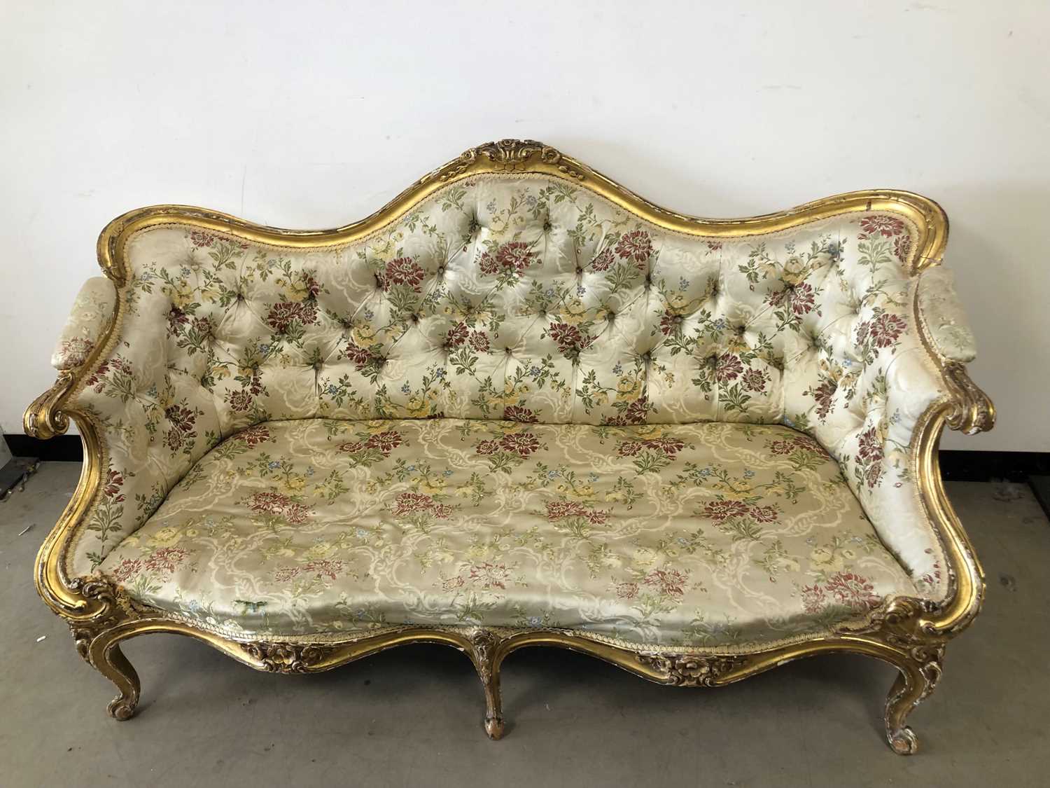 A French giltwood settee,