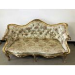 A French giltwood settee,