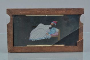 A Newton & Co Mahogany-Mounted Hand-Coloured Double Slipping Magic Lantern Slide,