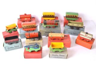 A large collection of Hornby 'M' series 0 Gauge Trains and Accessories (qty in 2 trays),