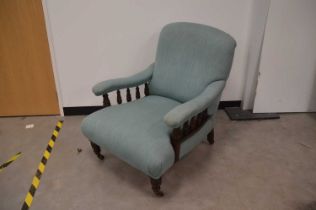 A late Victorian Howard & Sons style armchair,