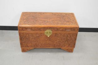 A modern Far Eastern carved wooden small chest,