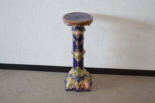A late Victorian pottery jardinière stand,