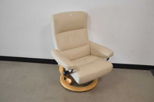 A modern Stress-Less white leather reclining armchair,