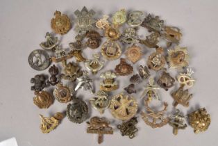 A good collection of WWI British and later Military cap badges,