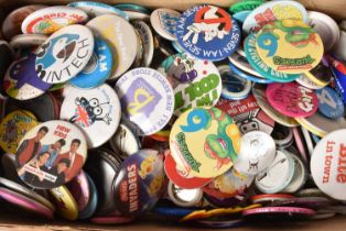 A collection of badges,