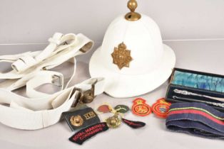 A Royal Marine Pith helmet,