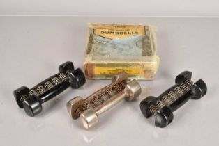 A pair of Terry's Steel Spring Loaded Dumb Bells,