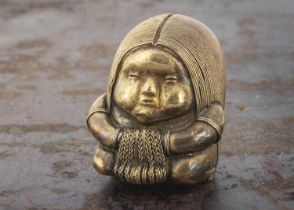 A yellow metal Columbian Quimbaga seated figurine,