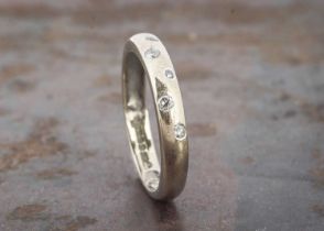 An 18ct gold diamond set dress ring,
