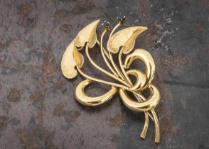 A Continental yellow metal 18ct gold floral spray brooch,