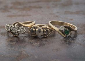 Three 9ct gold gem set dress rings,