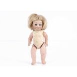 A small Armand Marseille 253 Nobbi Kid googly-eyed baby doll,