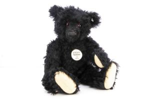 A large Steiff limited edition 1912 replica black teddy bear,