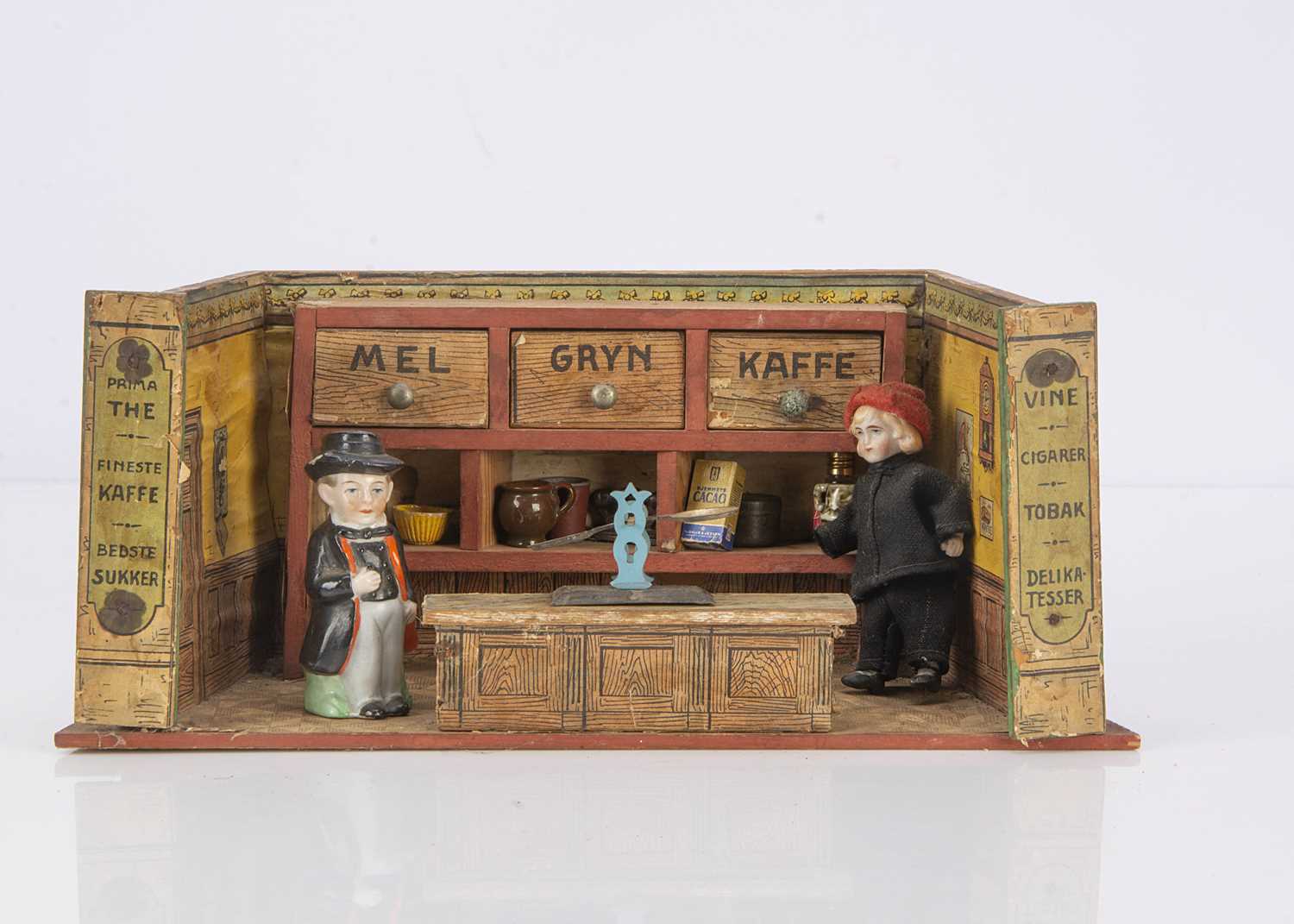 A Dutch market wooden toy shop 191020s, with produce drawers and