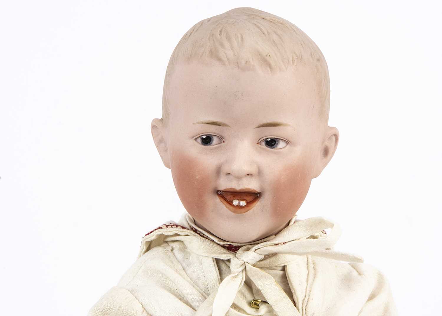 A Gebruder Heubach character laughing boy doll,