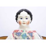 A rare Kloster Veilsdorf china shoulder-head glass eyed Grenier-type child doll 1860s,