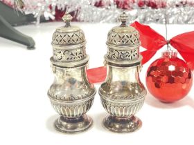 A pair of George V period silver sugar sifters by S.B.S Ltd,