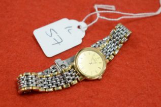 An Omega De Ville quartz stainless steel and gilt lady's wristwatch,