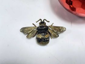A modern silver gilt and enamelled honey bee brooch by AIO,