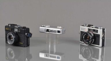 Three Compact Cameras,