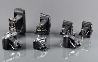 A Tray of Zeiss Ikon Folding Cameras,