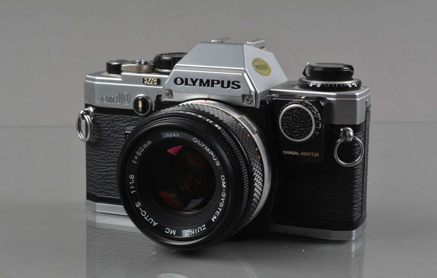 An Olympus OM-10 SLR Camera,