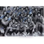 RANGERS AUTOGRAPHS B/W 12 x 8 photo depicting players celebrating in the dressing room following a