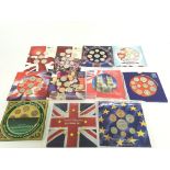 A collection of coin sets including UK brilliant c