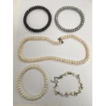 A small group of cultured pearl jewellery comprisi