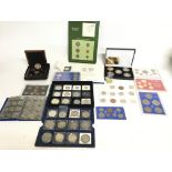 A collection of various coins and rounds including