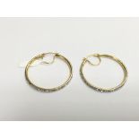 A pair of 9ct gold crystal set hoop earrings, appr