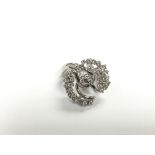 An 18ct white gold multi diamond set cluster ring,