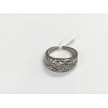 A 9ct white gold multi stone ring set with baguett