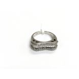 An 18ct white gold multi diamond set ring, approx