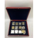 Cased commemorative coin collection.