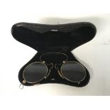 A pair of vintage German spectacles in a fitted ca