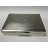 A hallmarked silver cedar lined cigarette box with